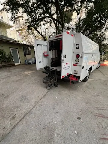 Magnet Plumbing service vehicle on-site for Grease Trap Cleaning in Lake San Marcos